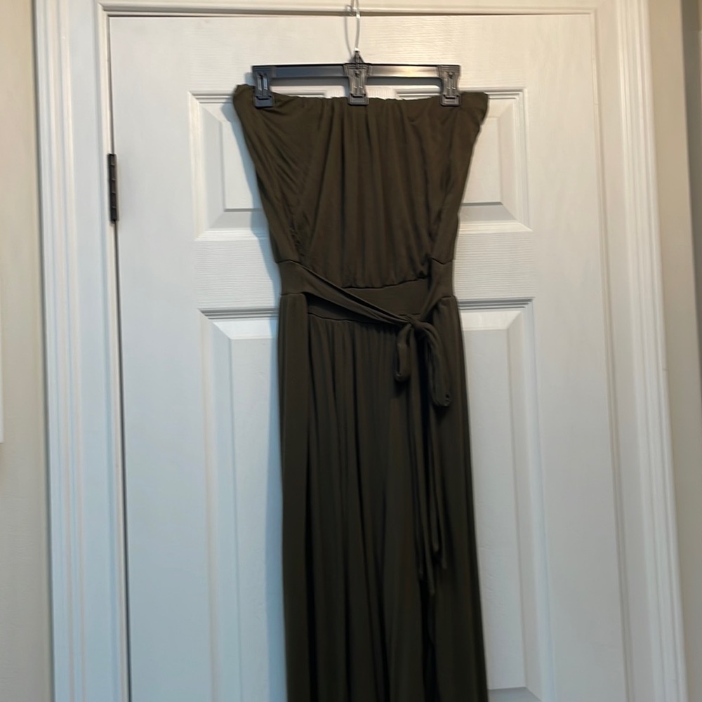 Army green jumpsuit with tulip style bottom. Size S.